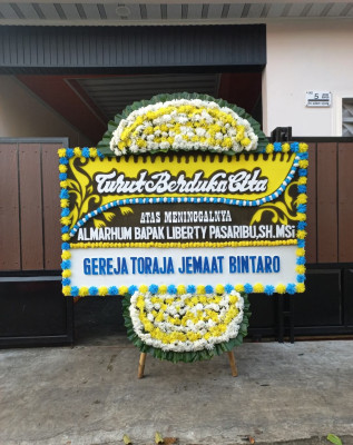 Papan Bunga Duka di Pendowoharjo